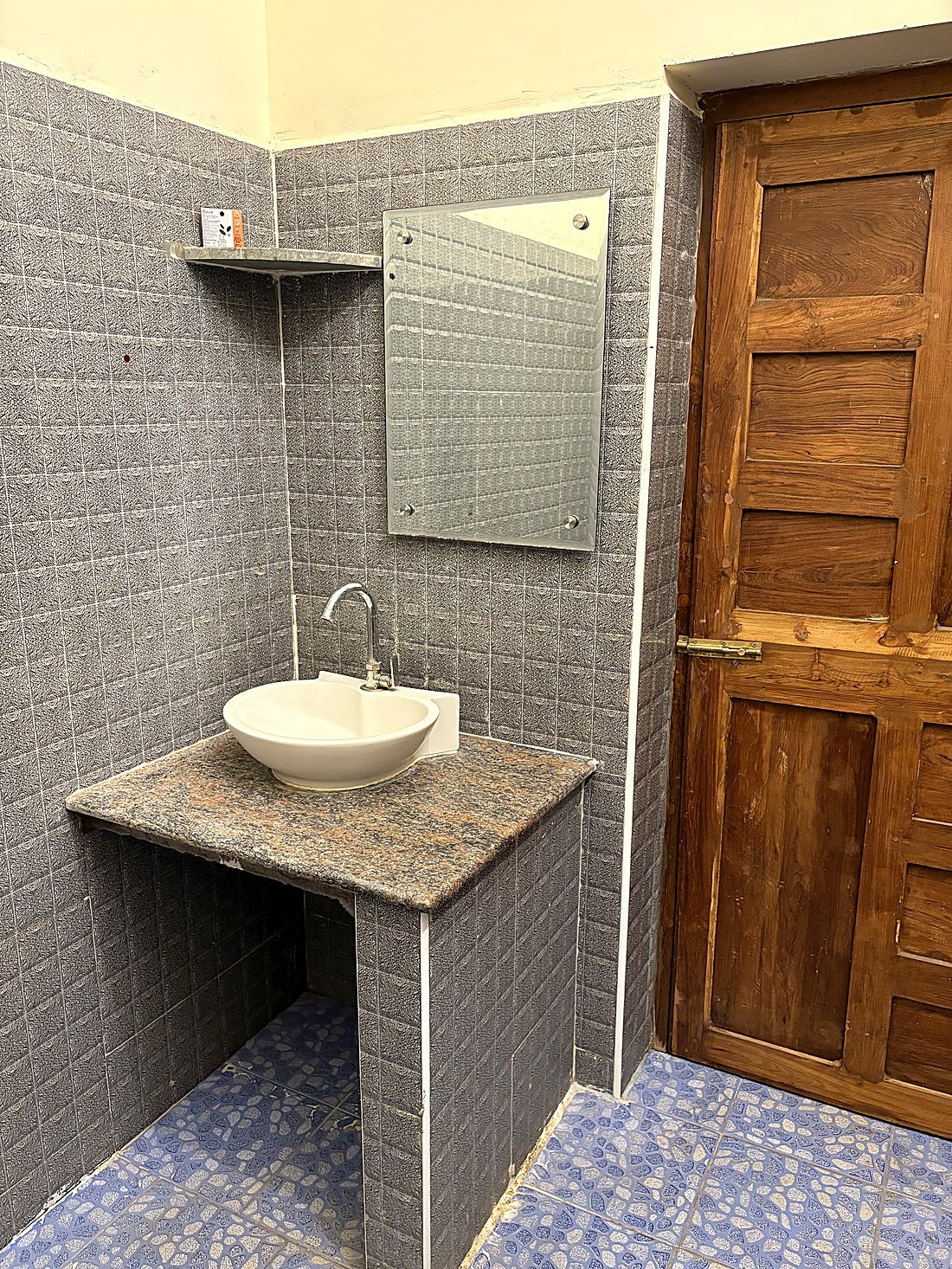Attached bathroom with sink